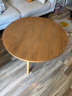 Round wood coffee table