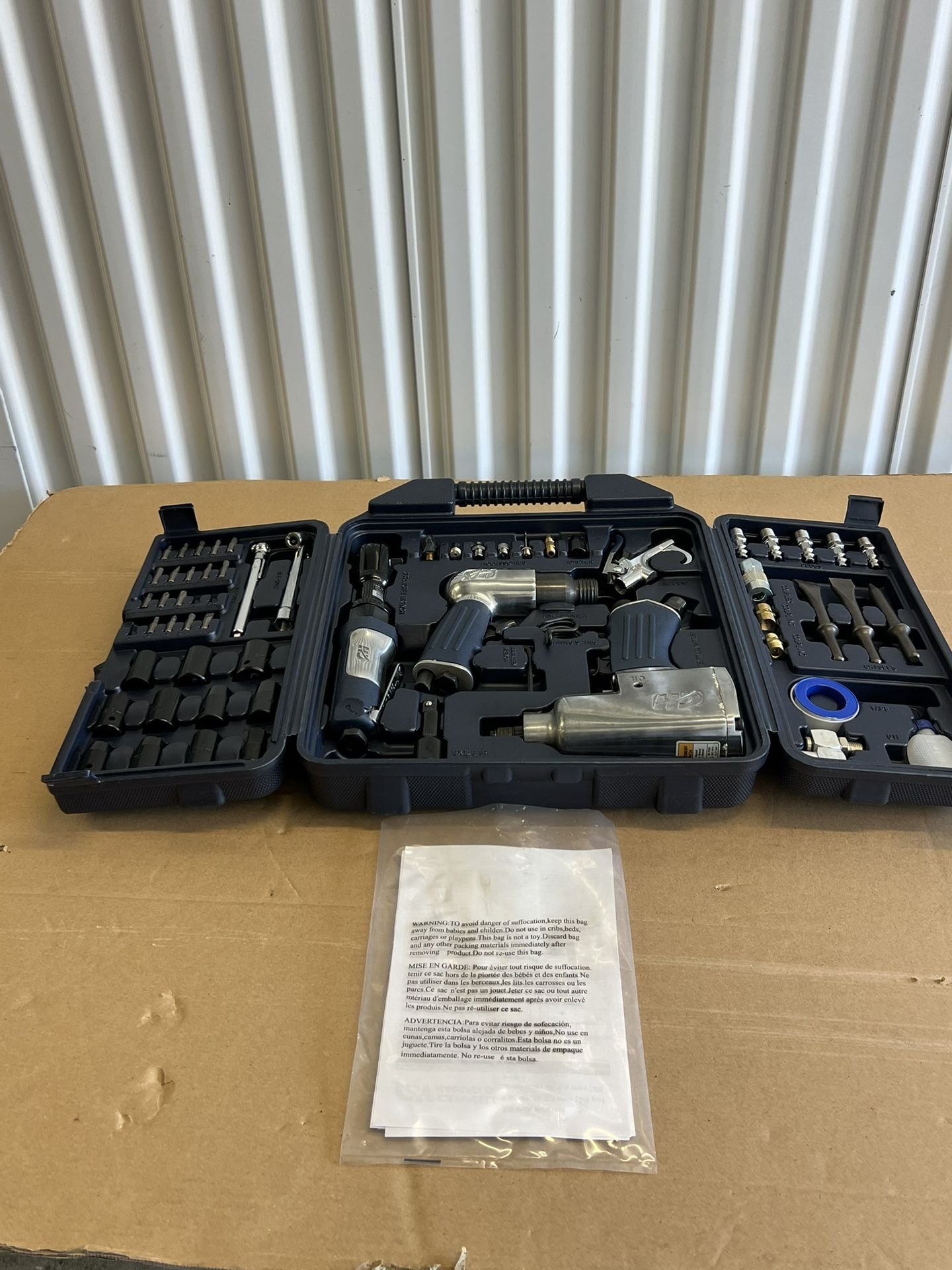 The Campbell Hausfeld 62-piece air tool kit, Air Compressor