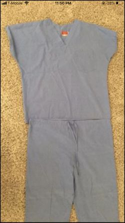 Used Blue Scrubs Size Large with paint mark on back pocket