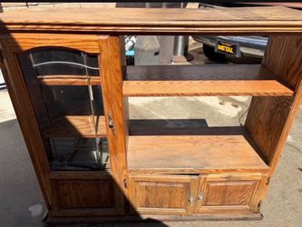 Freeee need gone today. Oak Wood Entertainment Center with Display Cabinet