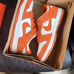 Orange jordan 1 low