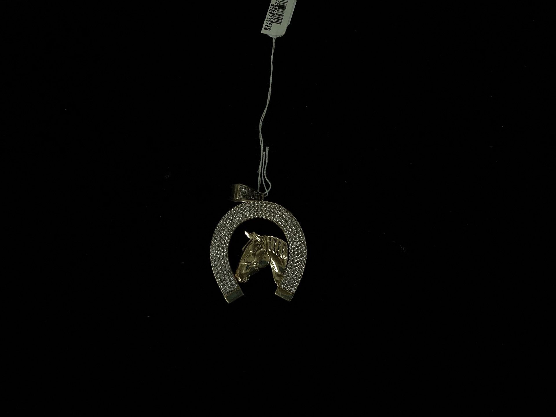 14K horse shoe gold pendant