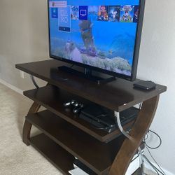 Entertainment Center TV Stand And TV