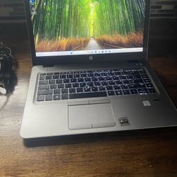 HP elite book with lighted keyboard 8 GB of RAM 256 GB SSD Drive Windows 11 and charger