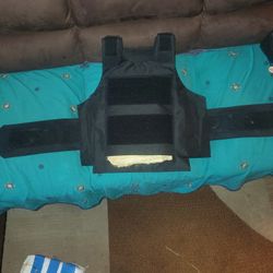 NEW WEIGHTED VEST, PACKED WITH HEAVY KEVLAR MATERIAL. FITS MEDIUM TO 2X.