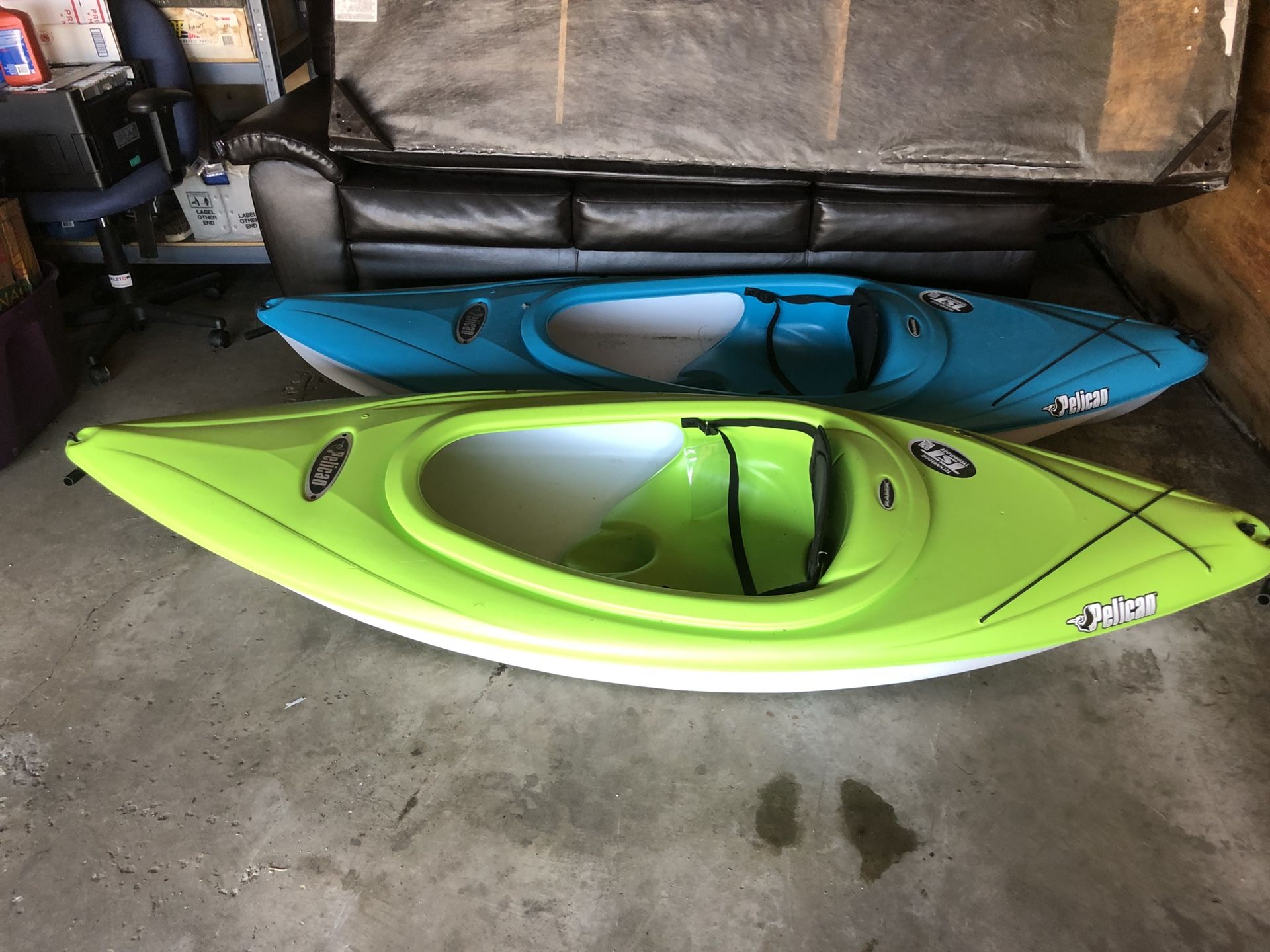 Two Pelican Kayak w their paddles