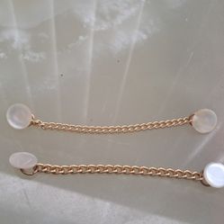 1950s Mother of Pearl Cardigan/Sweater Clips Two mother of pearl discs connected by two chains. Excellent condition! 