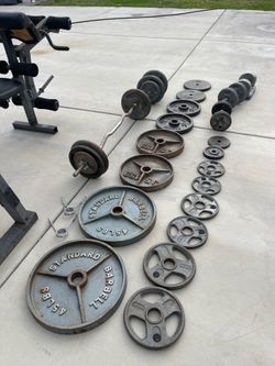 About 450 pounds of weights bench included