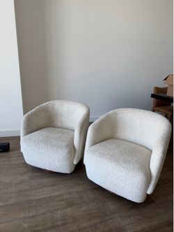 White boucle swivel chair