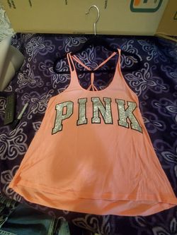Like new pink tank top size med. 20$ worn 1 time.