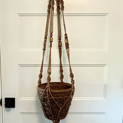  Large 5 foot 3” ( 63”) vintage boho macrame jute plant hanger w/ wood beads.  Great condition. I will also include the planter pot for free 