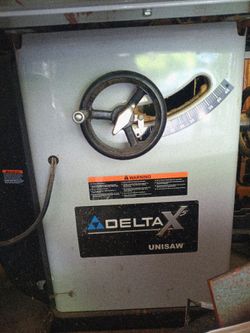 The Delta X5 Unisaw is a highly regarded, heavy-duty 10" cabinet table saw