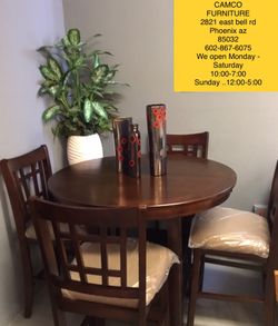 Counter high table/4 chairs ..$298 ..ON SALE THIS WEEK.. BRAND NEW ..{contact info removed}