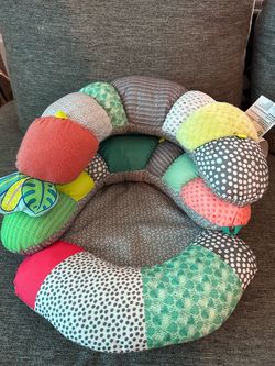Baby tummy time and seated support