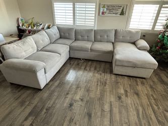 SECTIONAL  SOFA , Complete With Mini - Sleeper Pull Out And Storage For Pillows , Toys , Blankets Etc 