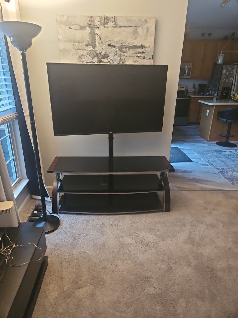 55 Inch LG TV W/glass Stand