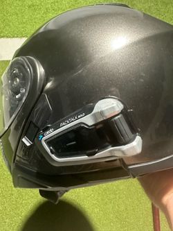 Large Shoei Neotec II with Cardo bold.