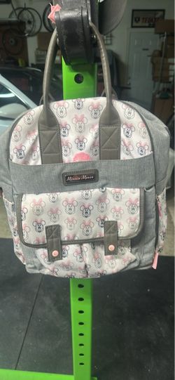 Diaper bag Minnie Mouse back pack Has a small water stain at the bottom Used in good condition all zippers open good. Pick up in west Lancaster Cas