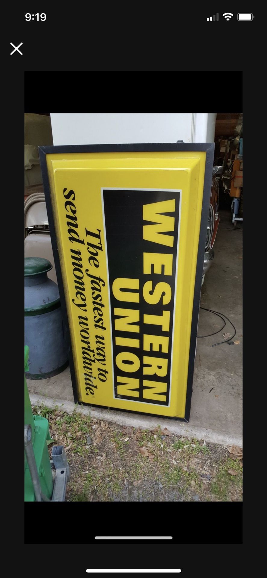 Western Union Sign Lights Up