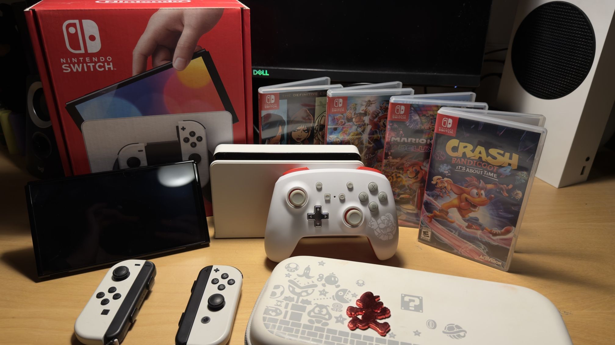 Nintendo Switch OLED + 4 Games + Wired Controller + Carrying Case