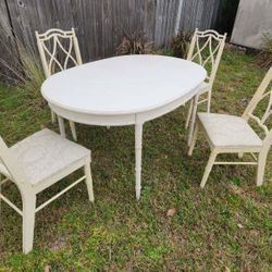 Faux bamboo chippendale style dining room set table with 4 chairs. Can sell the table and chairs. Together $395 Just the table $65 Chairs only $375 In