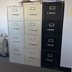 4 Drawer File Cabinets.