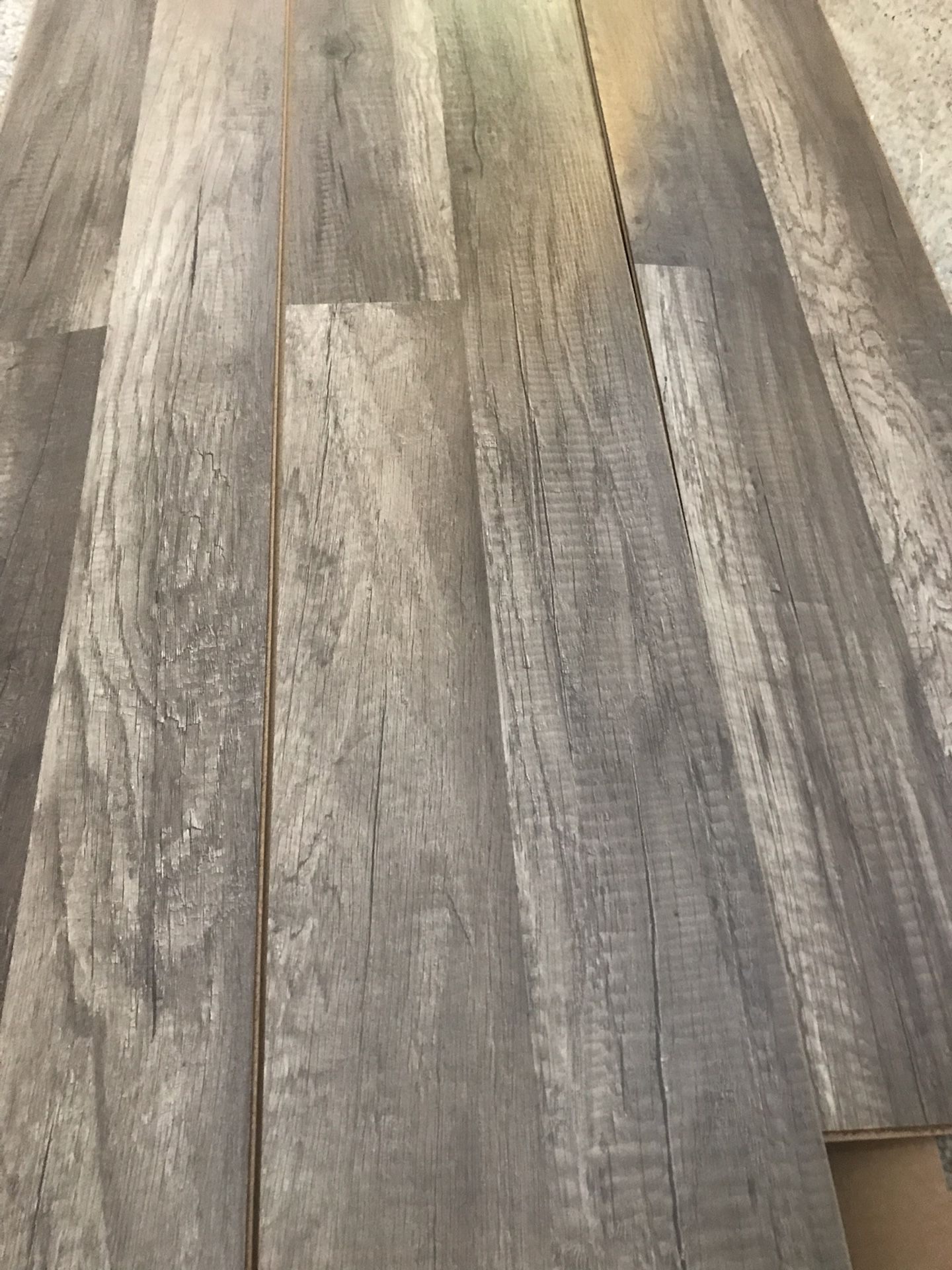 Roughly 20 sq ft grey oak traffic master homedepot laminate flooring