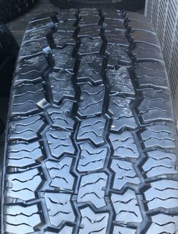 (ONE) CHEVY 8 LUG  WHEEL/RIM WITH LT 265 75 16 COOPER A/T