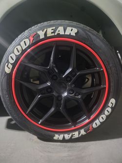 Set of 4 Tires and rims plus red rim protecters