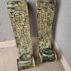 2 Vintage carved metal candle holders