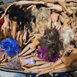 Barbies And Barbie Clothes