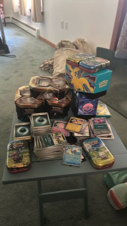 Pokémon cards tins boxes all opened great for collectors