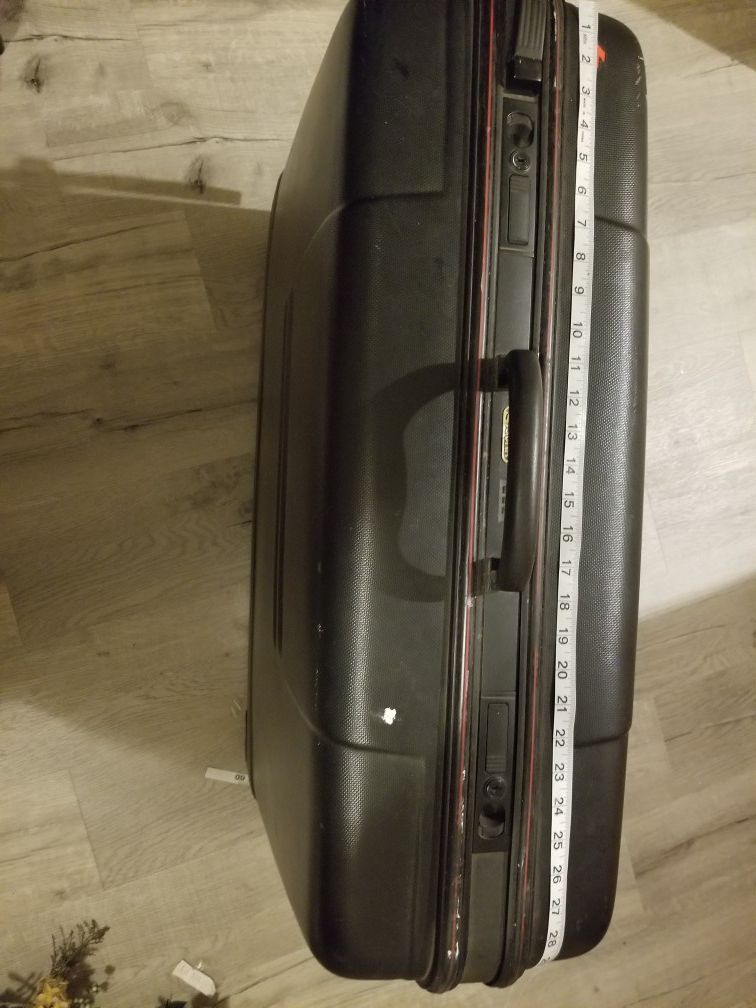 Free 30 in L wheeled suitcase