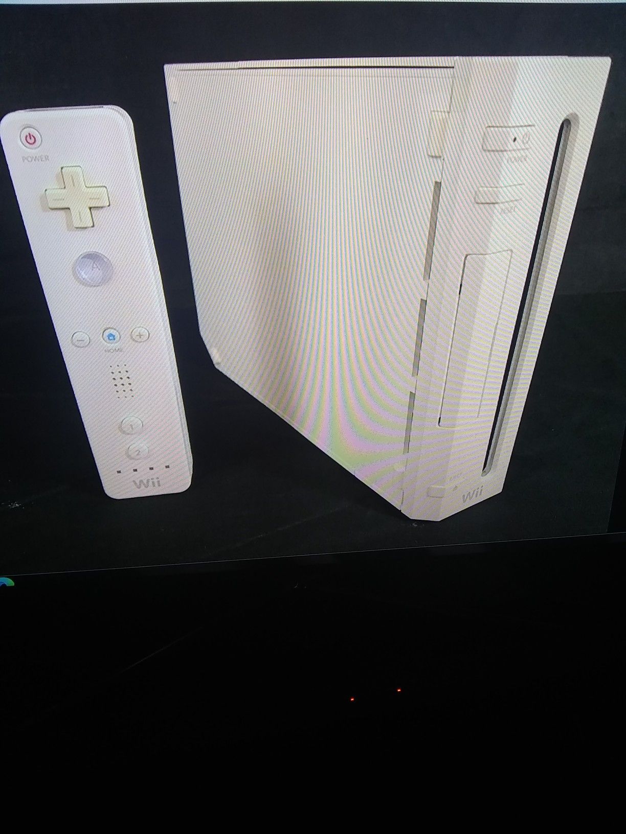 Nintendo Wii White video game console. Comes with one DVD sporting edition has several good games