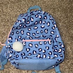Cheetah print Purple/Pink Kids Backpack. Has a large stain on back see pics