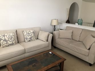 Cream Sofa & Loveseat $300. Comes with Grey cover for both. Pick-up only & Cash only