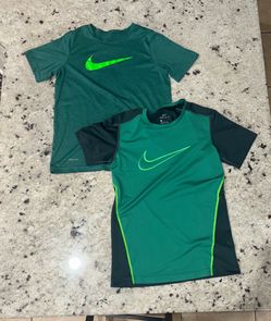 Two youth large, green Nike Dri-FIT