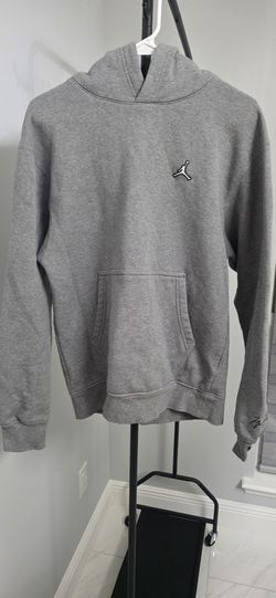 Men’s grey air Jordan hoodie. Good condition signature left sleeve near wrist SzM