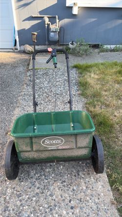Fertilizer and seed spreader