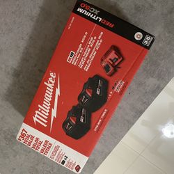 Milwaukee M18 (2) 5.0 XC Batteries And Charger