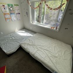 2 Low Full Sized Bed Frames With Wrapped Mattresses