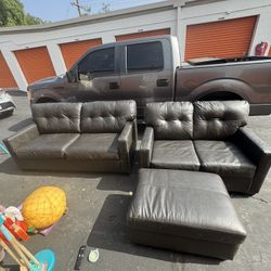 Ashley furniture leather couches been in storage 