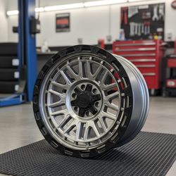 AXE Rim (Gray with Black)  Modern Tech by AXE Wheels. ​Sophisticated two-tone finish with matte gray spokes and black accents. ​Best For: Modern truck