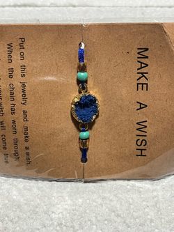 custom designed women's bracelet with blue stones