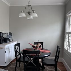 Round Black Dining Table And Rug