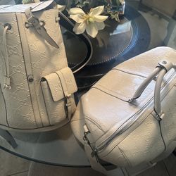 Gucci GG Embossed Backpack & Duffle Bag 