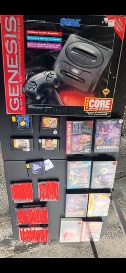 Sega Genesis in Box and several games