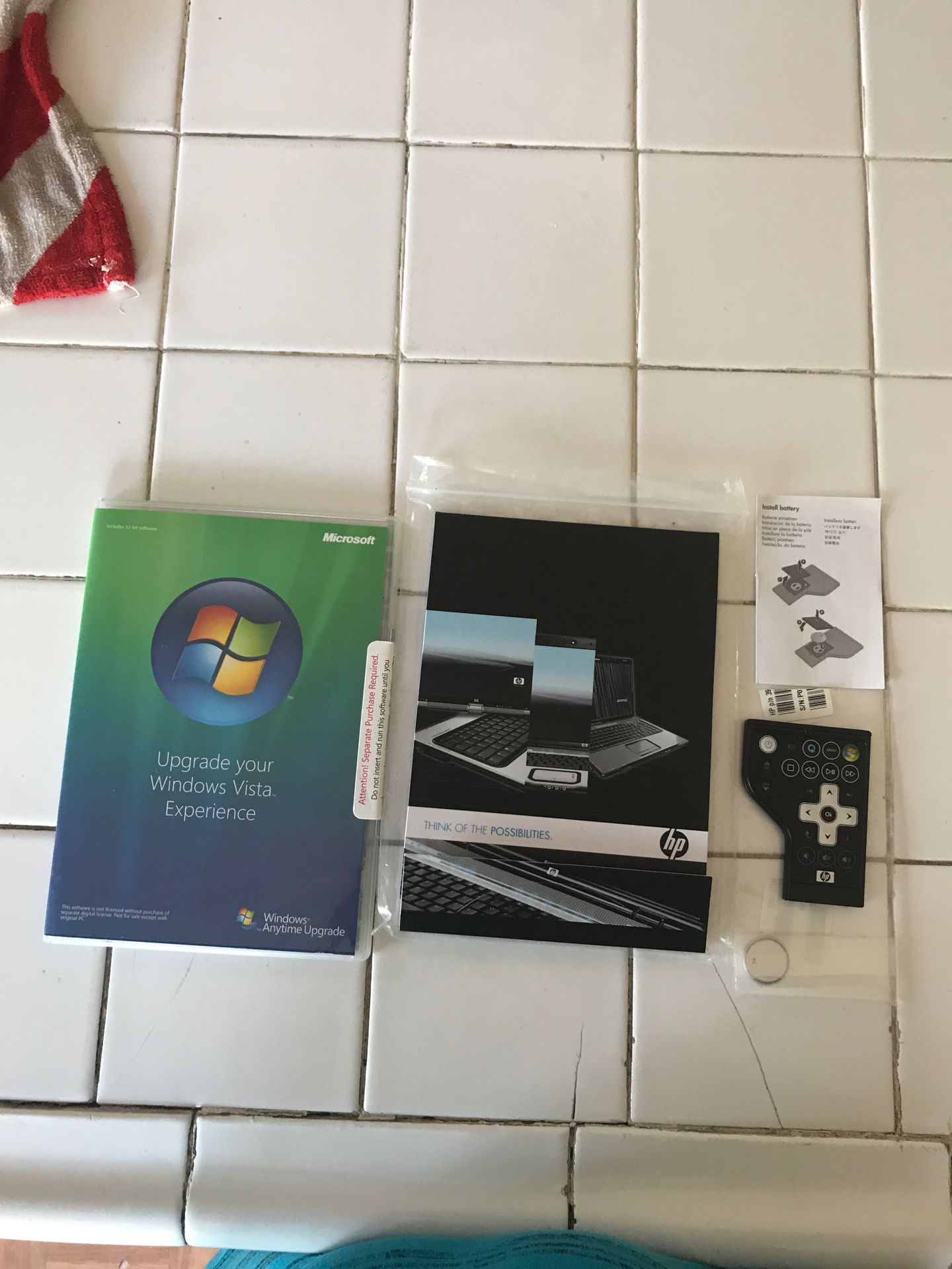 Hp notebook and remote for the computer 💻 and a Microsoft Windows anytime upgrade disc
