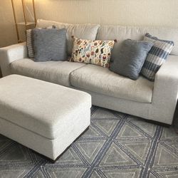 Couch, Pillows, Ottoman AND Large Area Rug!