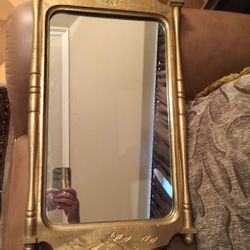 Vintage small gold color mirror